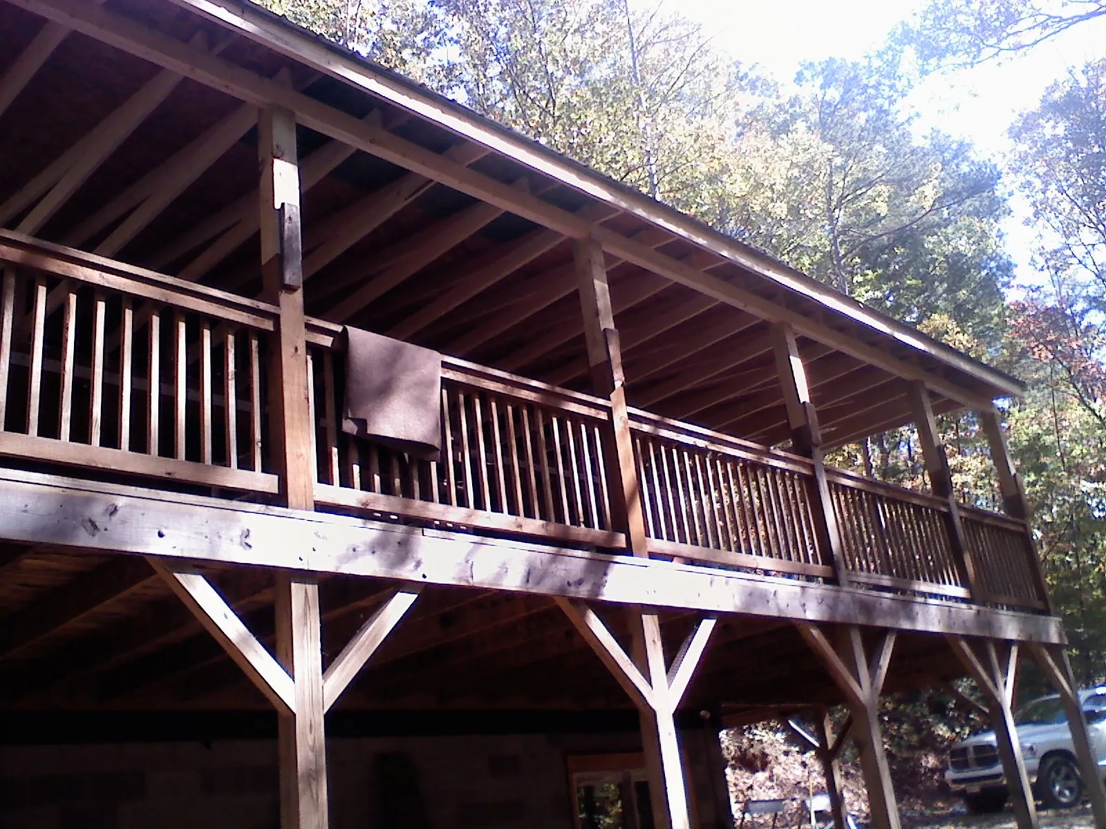 Timber framing under a new elevated porch and deck — Roof Leak Repair in Shiro by Roofing Brothers